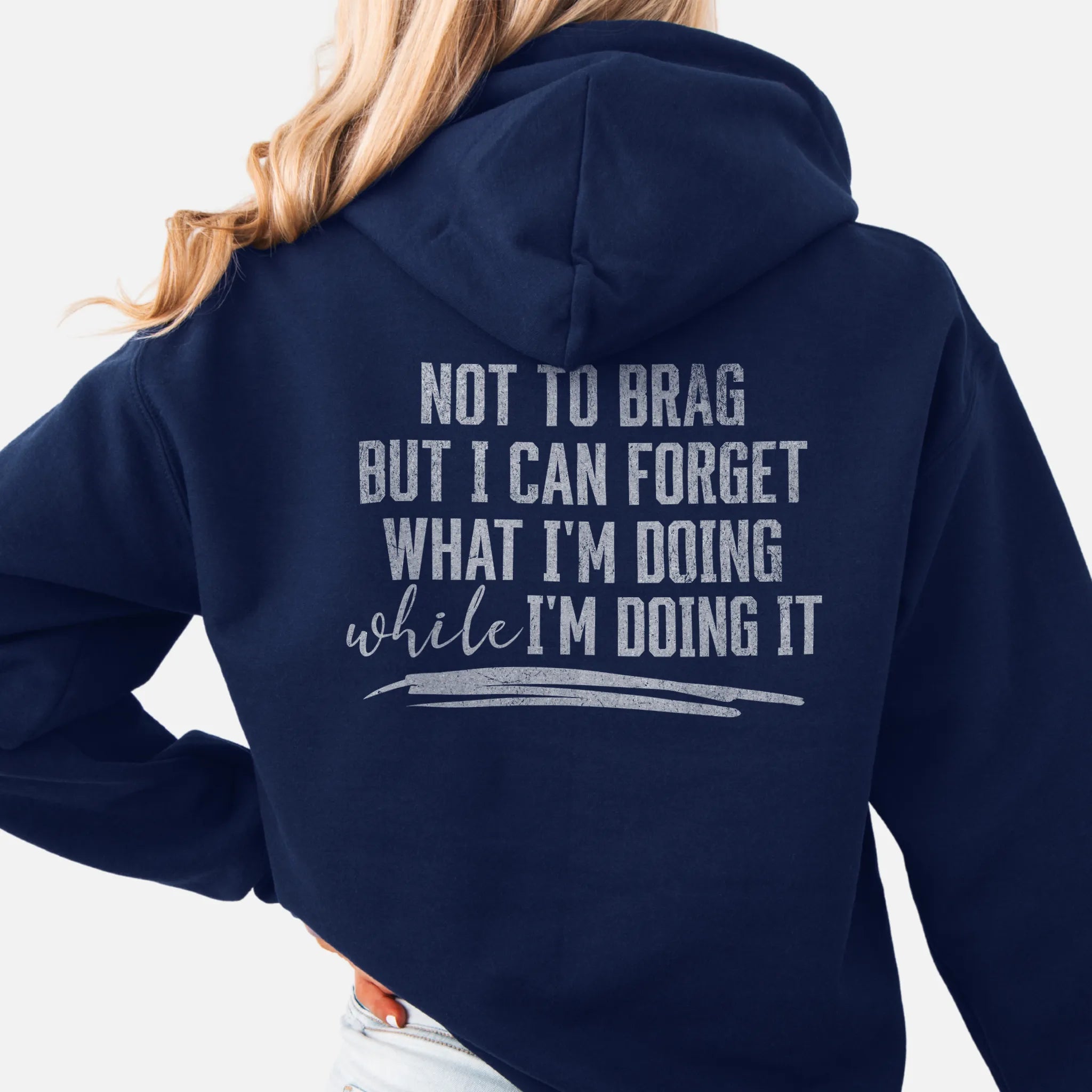 Navy Oakley June Hoodie back view large text Not To Brag But I Can Forget What I’m Doing While I’m Doing It underline distressed print