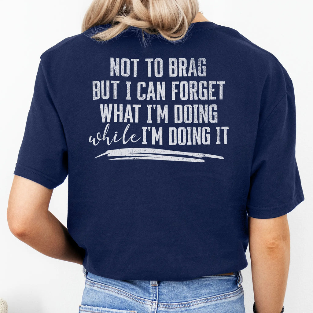 Navy Oakley June T Shirt back view large text Not To Brag But I Can Forget What I’m Doing While I’m Doing It underline distressed print