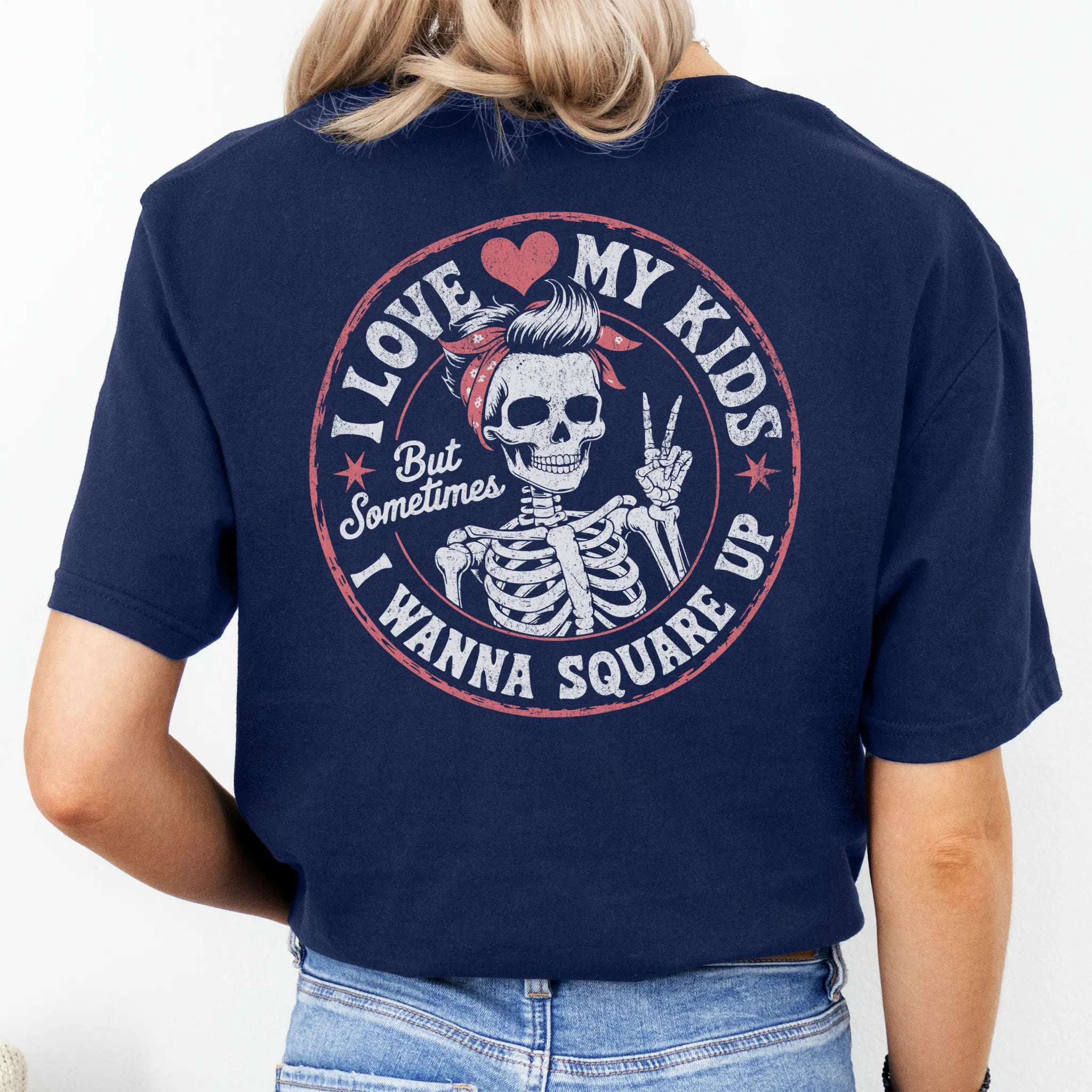 Navy t-shirt – large back graphic with skeleton mom in bandana and peace sign inside a round badge, headline reads “I Love My Kids But Sometimes I Wanna Square Up”, studio back view