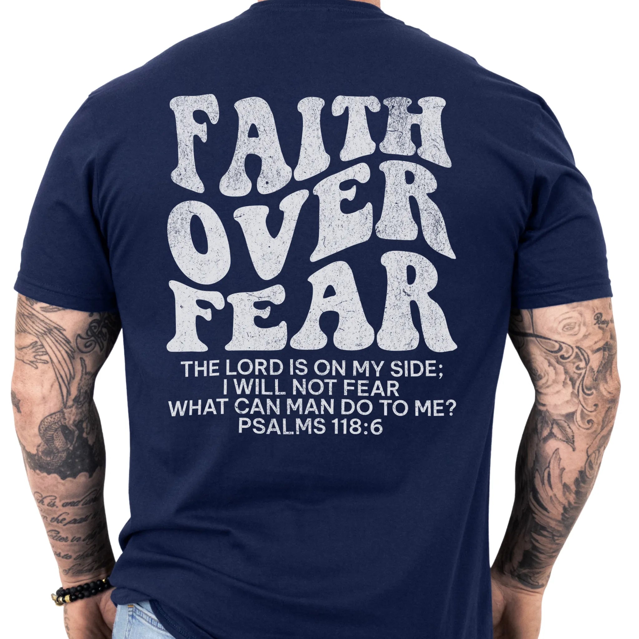 Navy Oakley June t shirt, mens fit, large back lettering reads Faith Over Fear with supporting scripture lines, studio back view