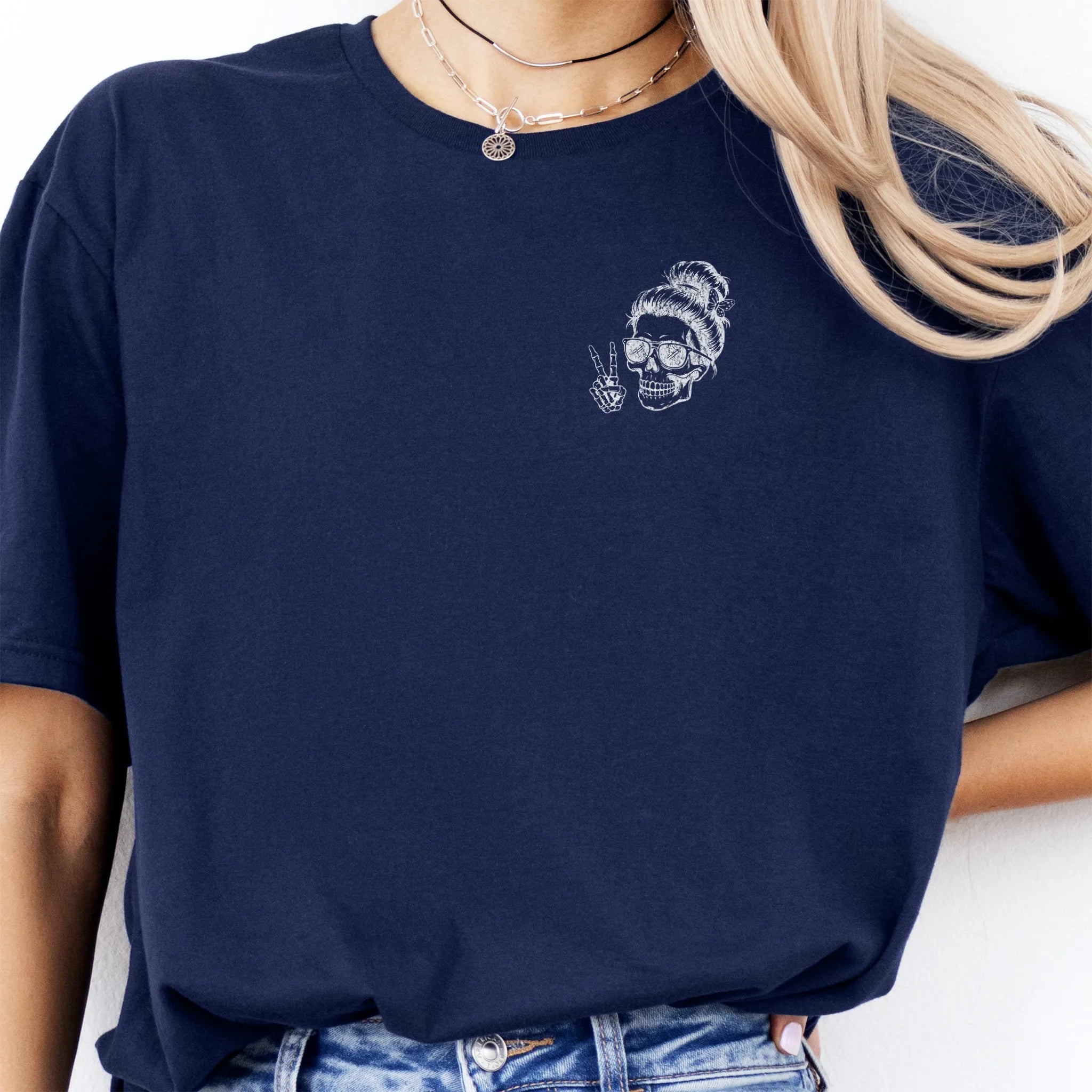 Navy Oakley June T Shirt front view small left chest skull with messy bun sunglasses peace sign minimalist mark distressed print