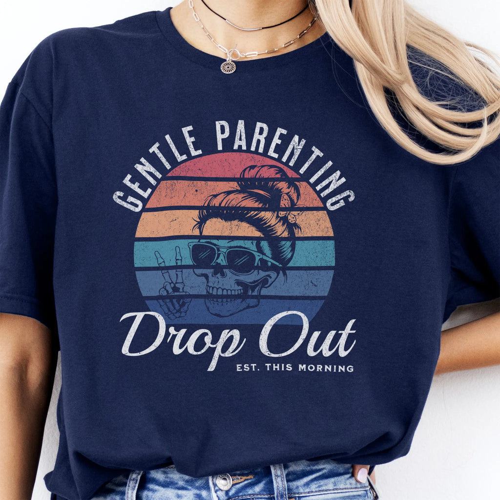 Navy Oakley June T Shirt front view Gentle Parenting Drop Out large chest graphic skull with messy bun sunglasses peace sign round retro stripe badge text Est This Morning distressed print
