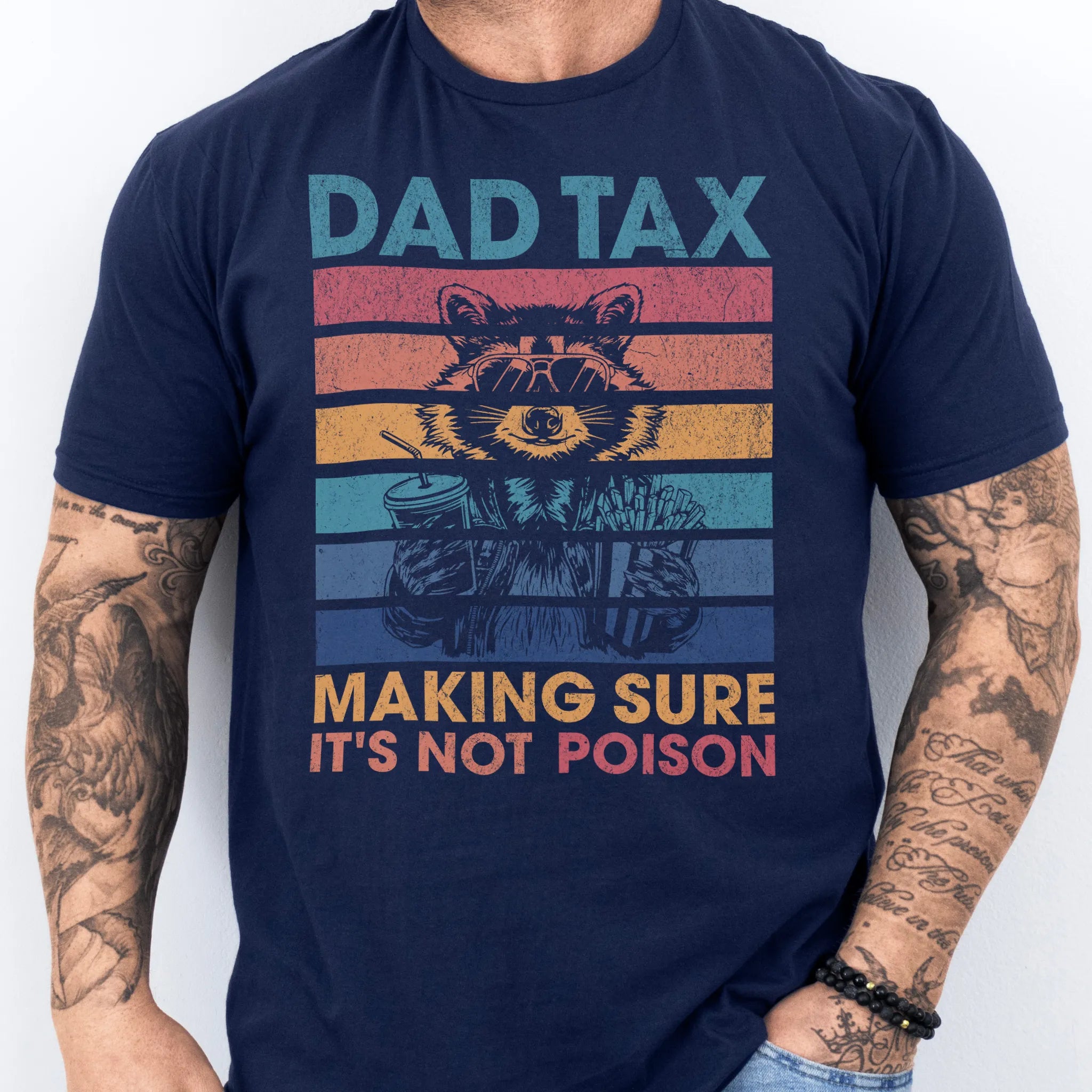Navy Oakley June T Shirt front view Dad Tax retro stripes raccoon wearing sunglasses holding soda and fries text Making Sure It’s Not Poison distressed print