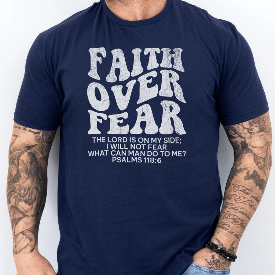 Navy Oakley June t shirt, mens fit, large front lettering reads Faith Over Fear with supporting scripture lines, studio front view