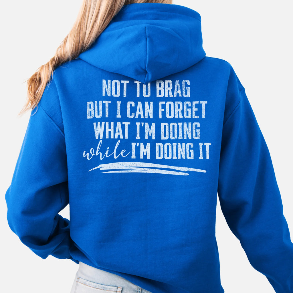 Royal Oakley June Hoodie back view large text Not To Brag But I Can Forget What I’m Doing While I’m Doing It underline distressed print
