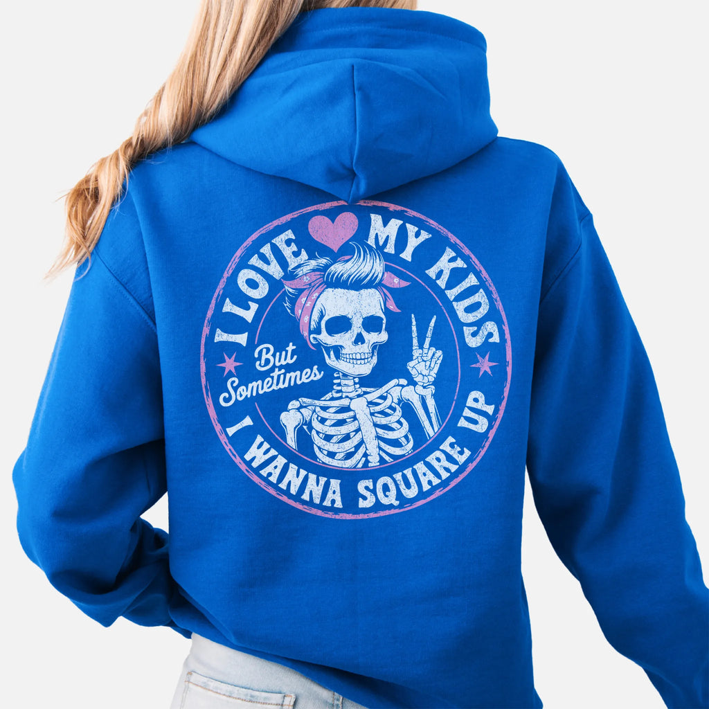 Royal Oakley June hoodie, large back circle graphic with skeleton mom giving a peace sign, text reads I Love My Kids But Sometimes I Wanna Square Up, studio back view