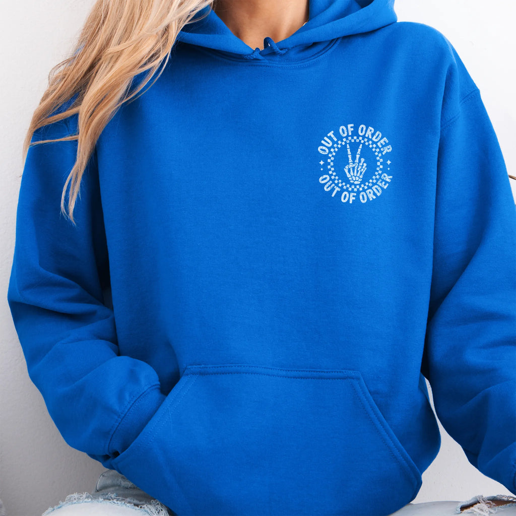 Royal hoodie – left chest circular badge with “Out of Order” text, kangaroo pocket and relaxed modern fit, studio front view
