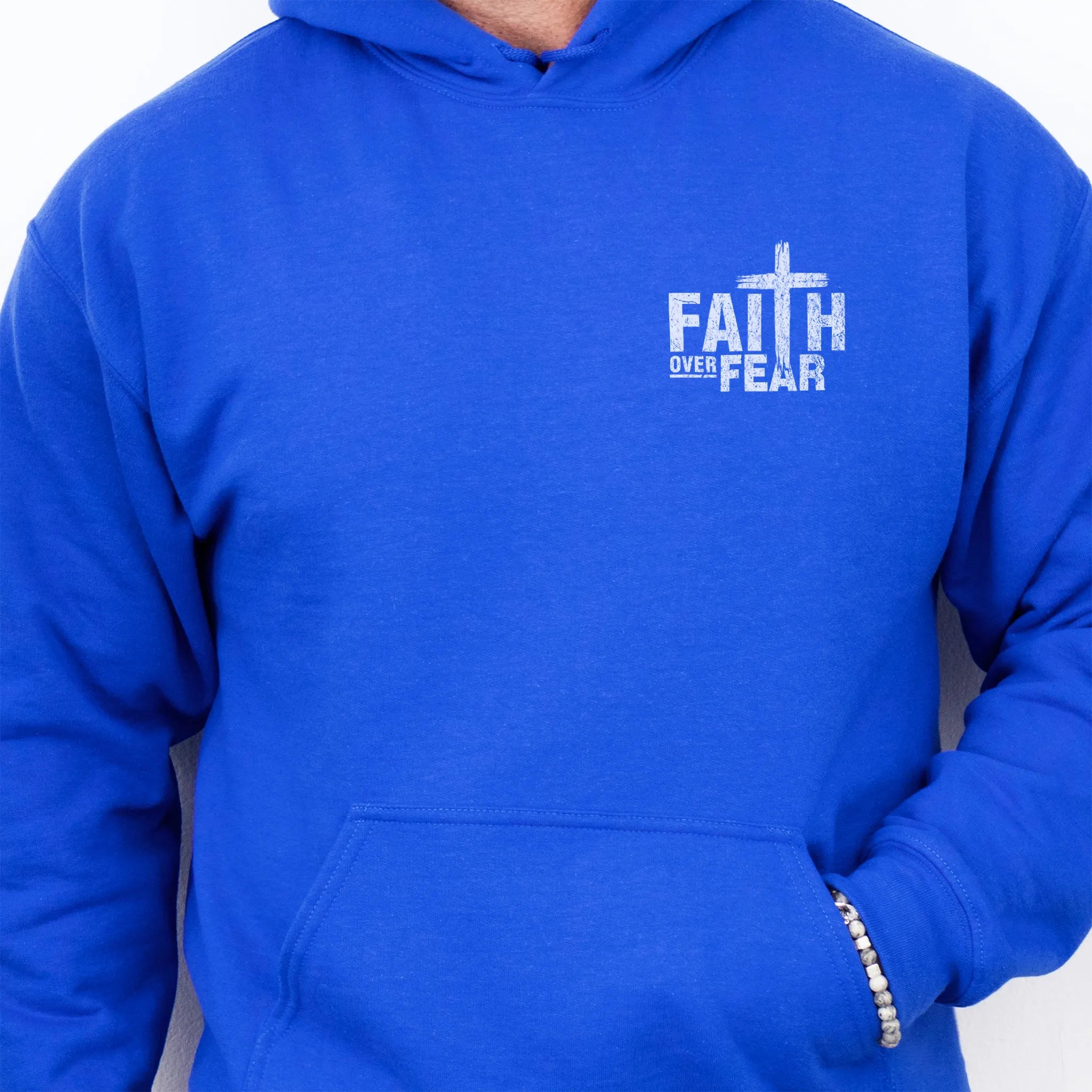 Royal Oakley June hoodie, mens fit, left chest badge reads Faith Over Fear with cross, kangaroo pocket, studio front view