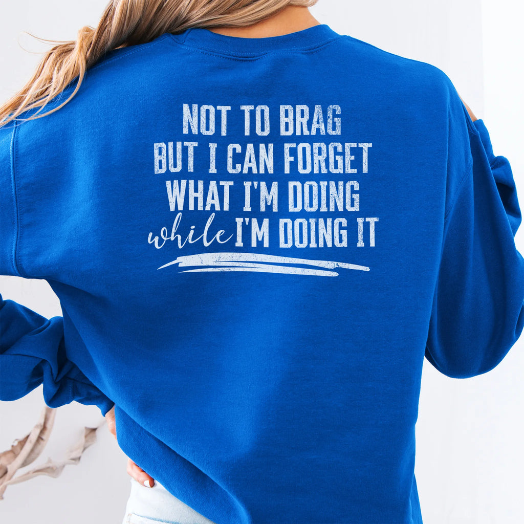 Royal Oakley June Sweatshirt back view large text Not To Brag But I Can Forget What I’m Doing While I’m Doing It underline distressed print