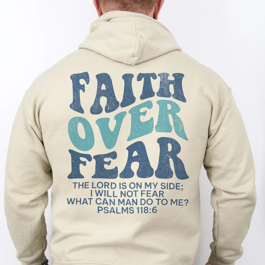 Sand Oakley June hoodie, mens fit, large back lettering reads Faith Over Fear with supporting scripture lines, hood up, studio back view
