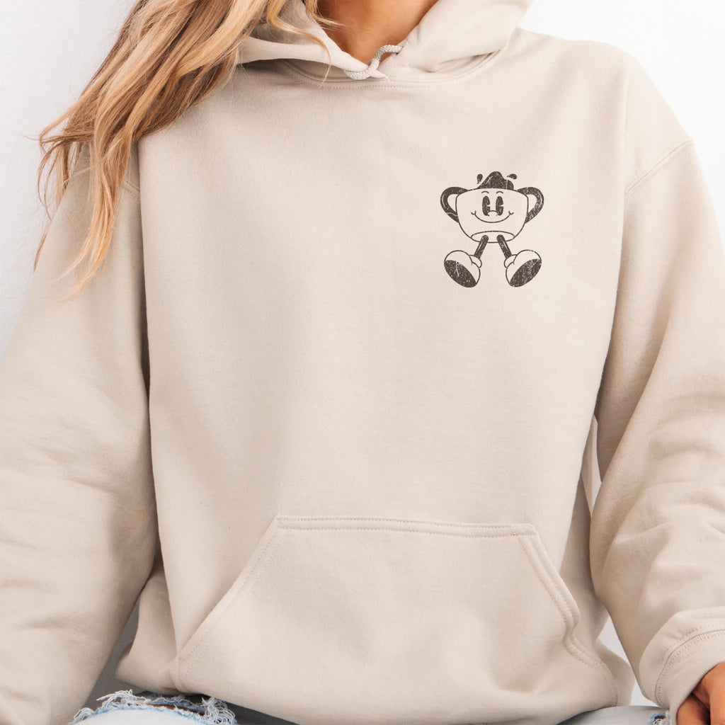 Sand Oakley June Hoodie front view small left chest coffee cup mascot Caffeinated Moms Club kangaroo pocket drawstrings visible distressed print