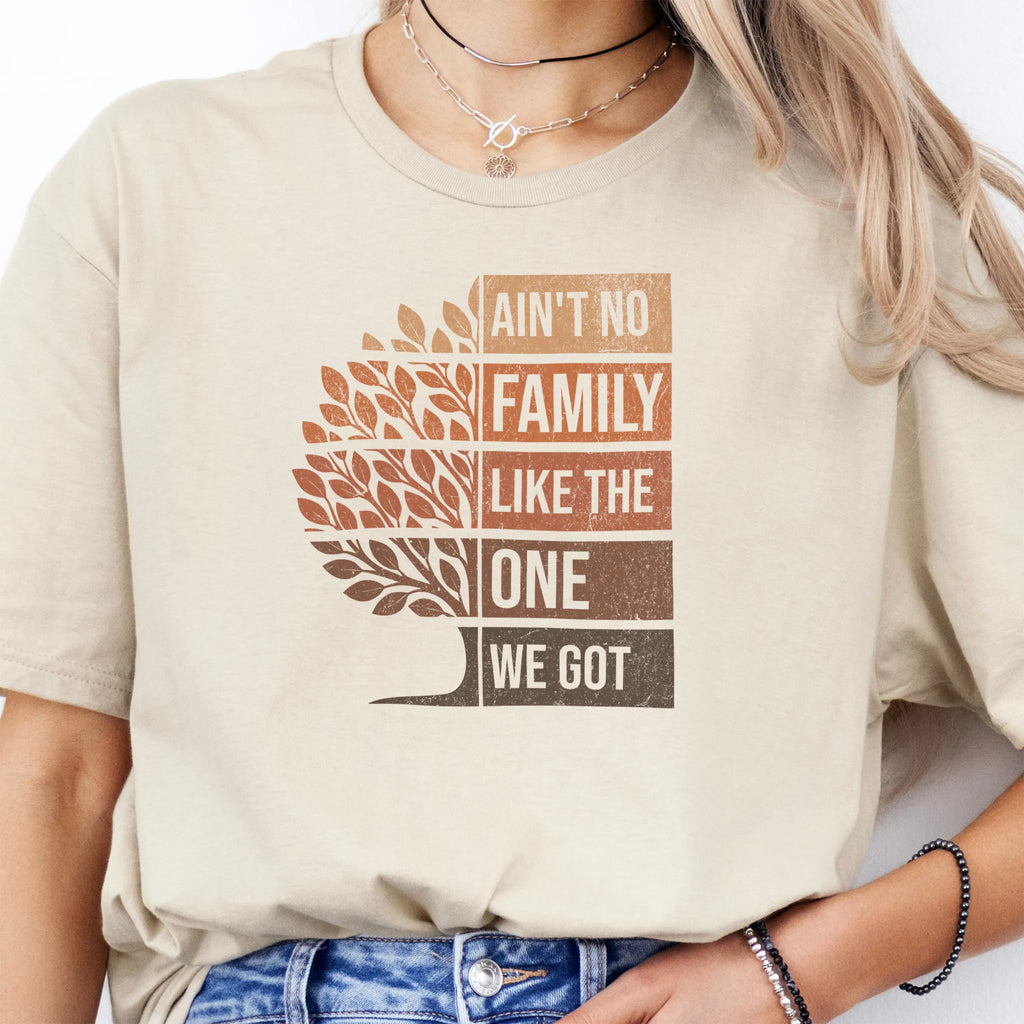 Sand Oakley June tee bold front print Ain’t No Family Like the One We Got with tree graphic