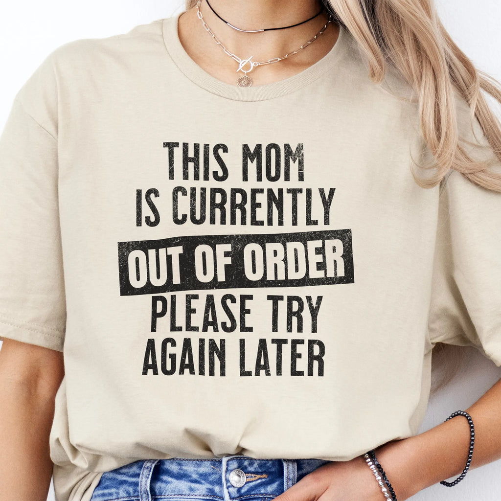 Sand Oakley June T Shirt front view large text This Mom Is Currently Out Of Order Please Try Again Later distressed print