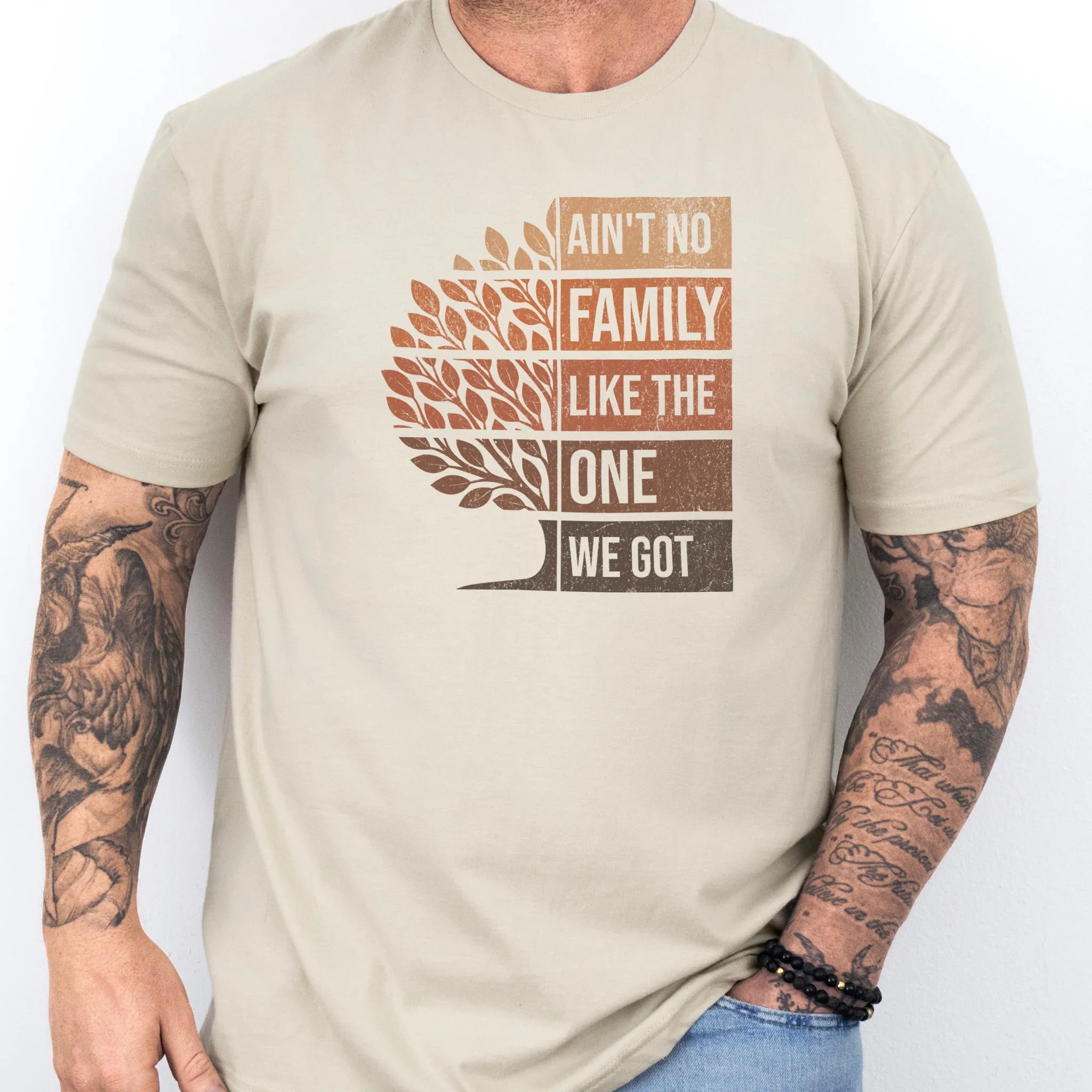 Sand Oakley June tee bold front print Ain’t No Family Like the One We Got with tree graphic