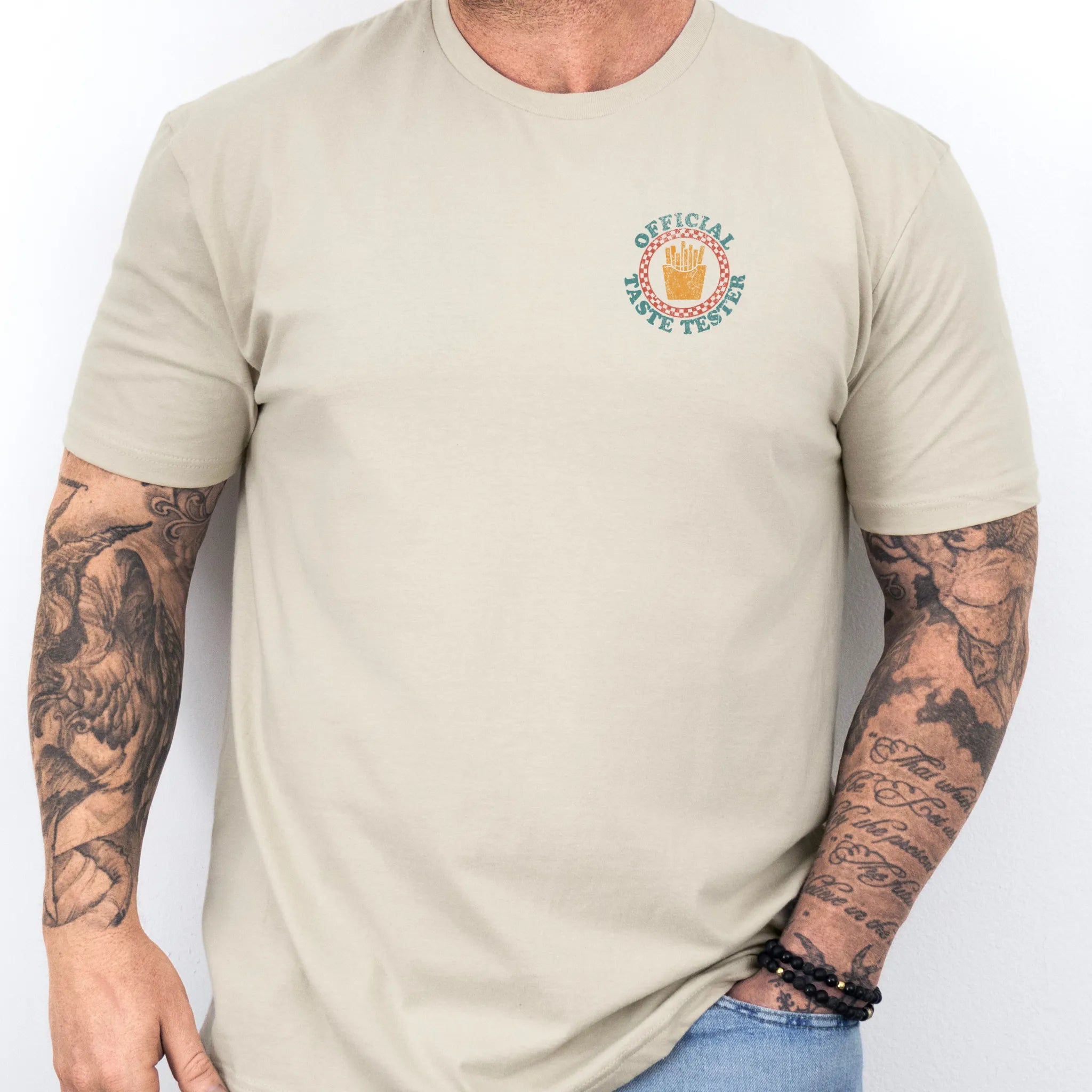 Sand Oakley June T-Shirt – Official Taste Tester left chest badge graphic