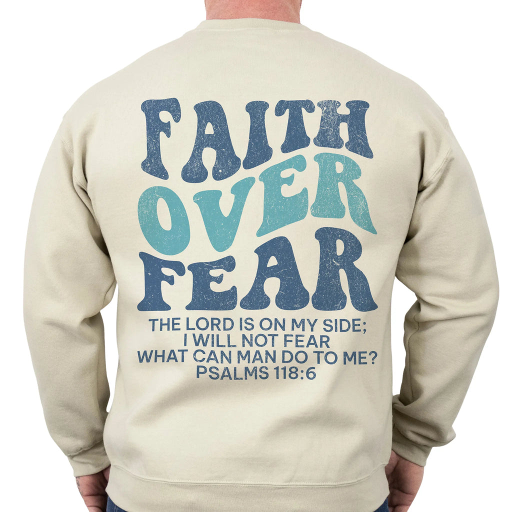 Sand Oakley June sweatshirt, mens fit, large back lettering reads Faith Over Fear with supporting scripture lines, studio back view