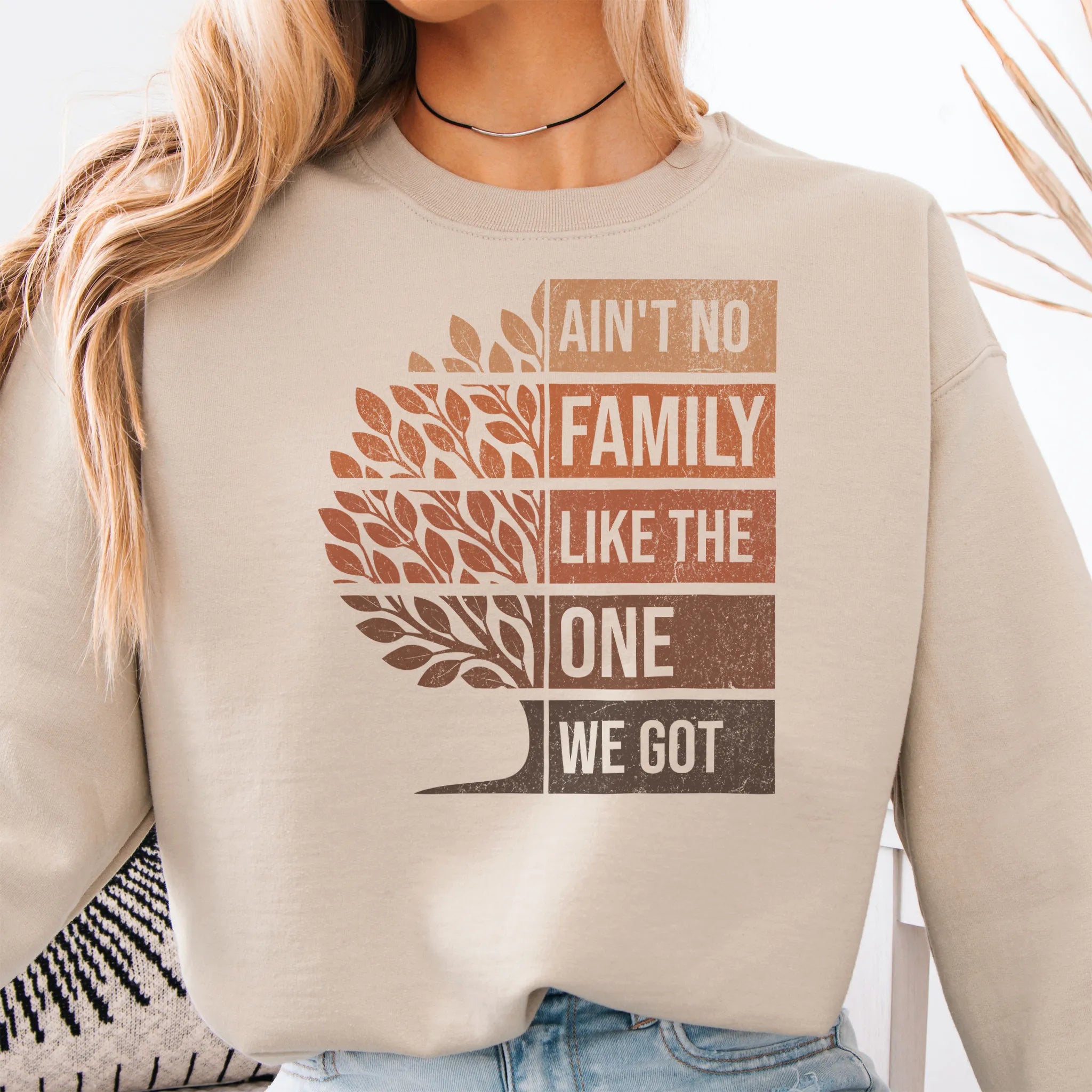 Sand Oakley June sweatshirt bold front print Ain’t No Family Like the One We Got with tree graphic