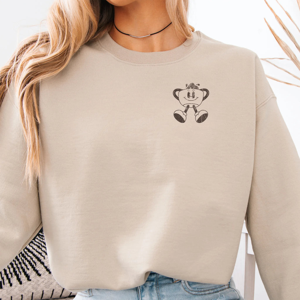 Sand Oakley June Sweatshirt back view Caffeinated Moms Club large circle badge text Running on Coffee and Chaos Sip Survive Repeat vintage coffee cup mascot distressed