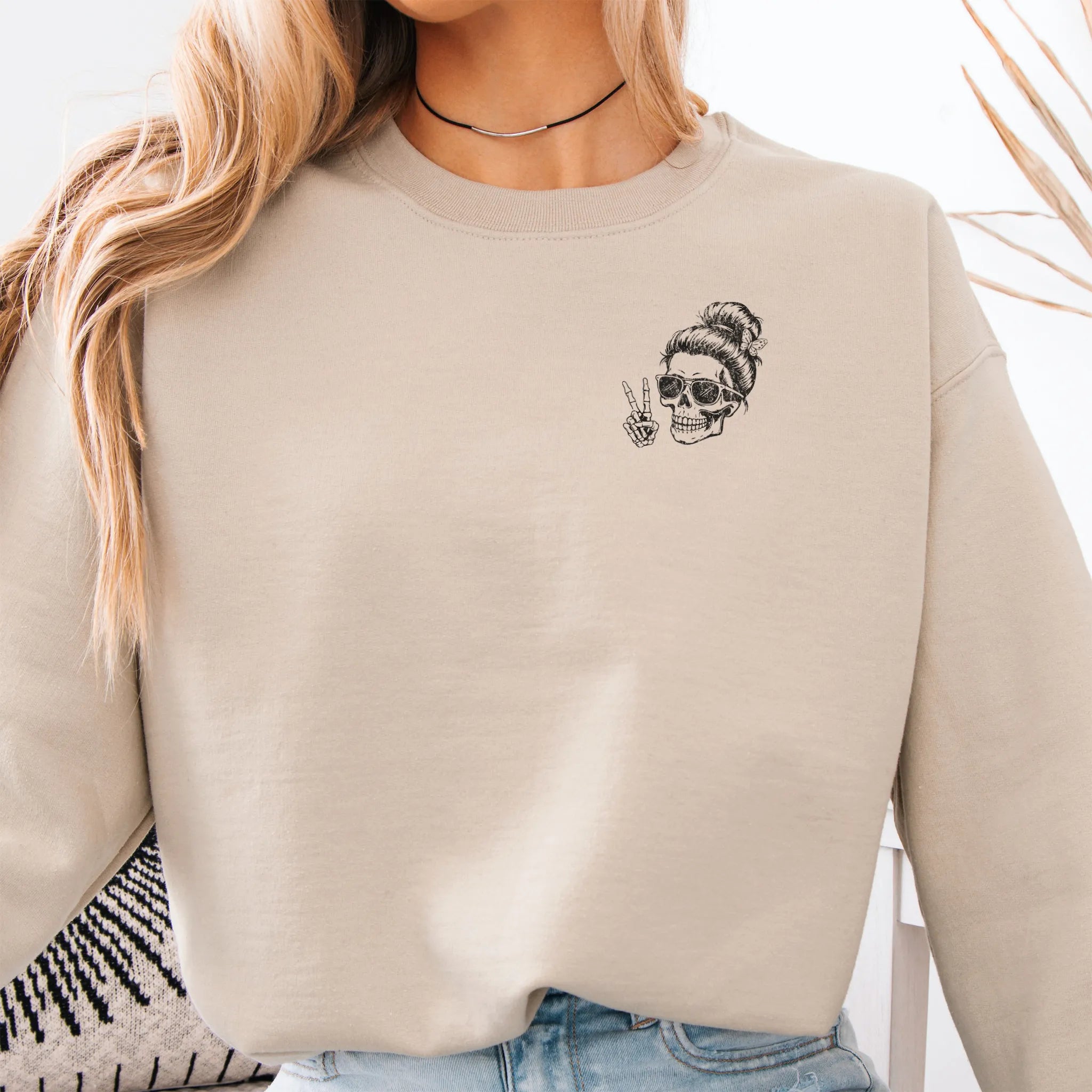 Sand Oakley June Sweatshirt front view small left chest skull with messy bun peace sign minimalist mark distressed print