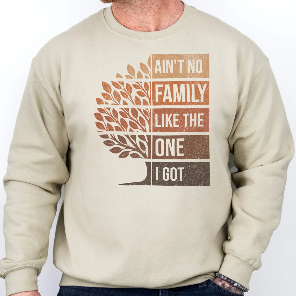 Sand Oakley June Sweatshirt – front only oversized tree graphic with text Ain’t No Family Like the One I Got, cozy unisex crewneck