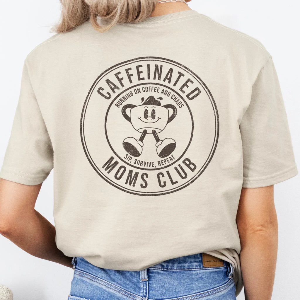 Sand Oakley June T Shirt back view Caffeinated Moms Club large circle badge text Running on Coffee and Chaos Sip Survive Repeat vintage mascot coffee cup distressed print