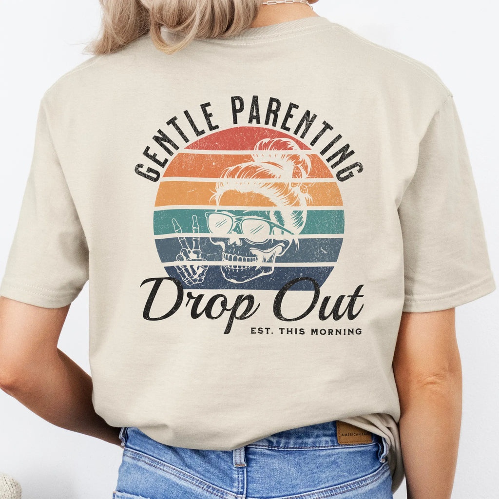 Sand Oakley June T Shirt back view Gentle Parenting Drop Out large round retro badge skull with messy bun wearing sunglasses peace sign script Est This Morning distressed print