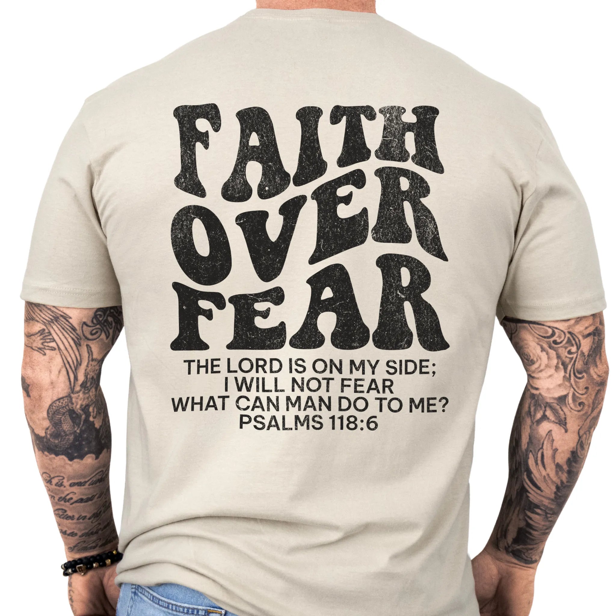 Sand Oakley June t shirt, mens fit, large back lettering reads Faith Over Fear with supporting scripture lines, studio back view