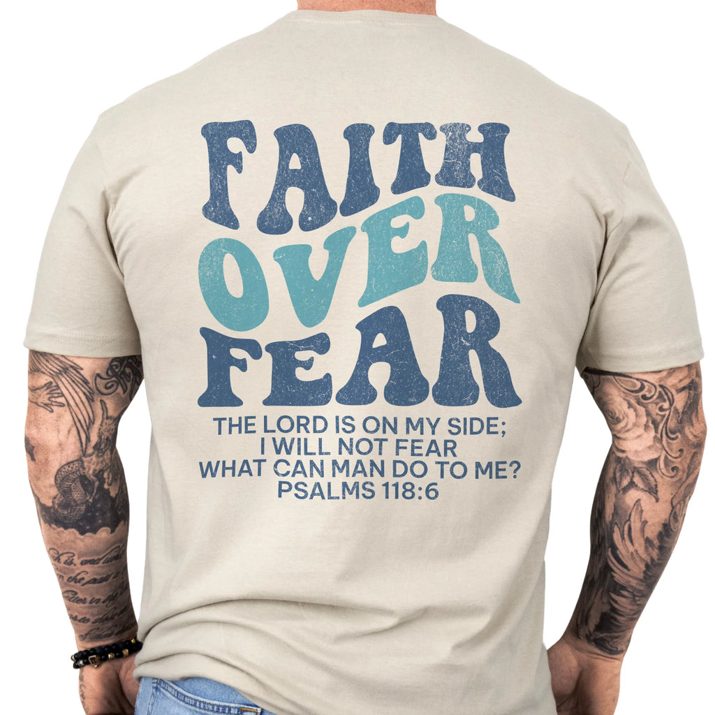 Sand Oakley June t shirt, mens fit, large back lettering reads Faith Over Fear with supporting scripture lines, studio back view