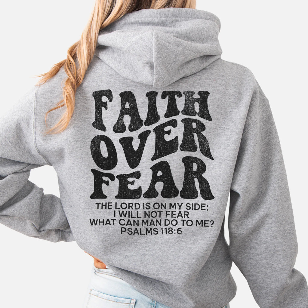 Sport Grey Oakley June hoodie, large back lettering reads Faith Over Fear with supporting scripture lines, hood up, studio back view