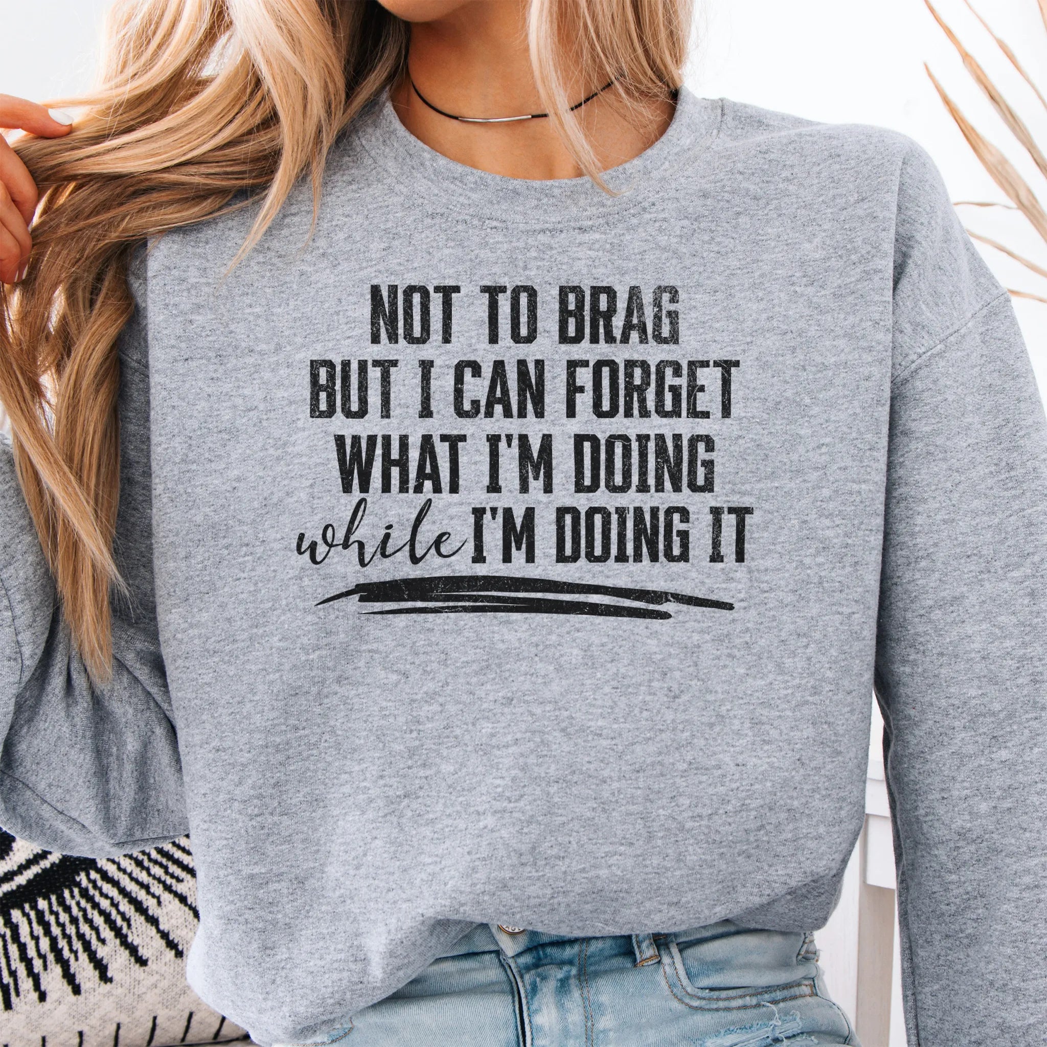 Sport Grey Oakley June Sweatshirt front view large text Not To Brag But I Can Forget What I’m Doing While I’m Doing It underline distressed print