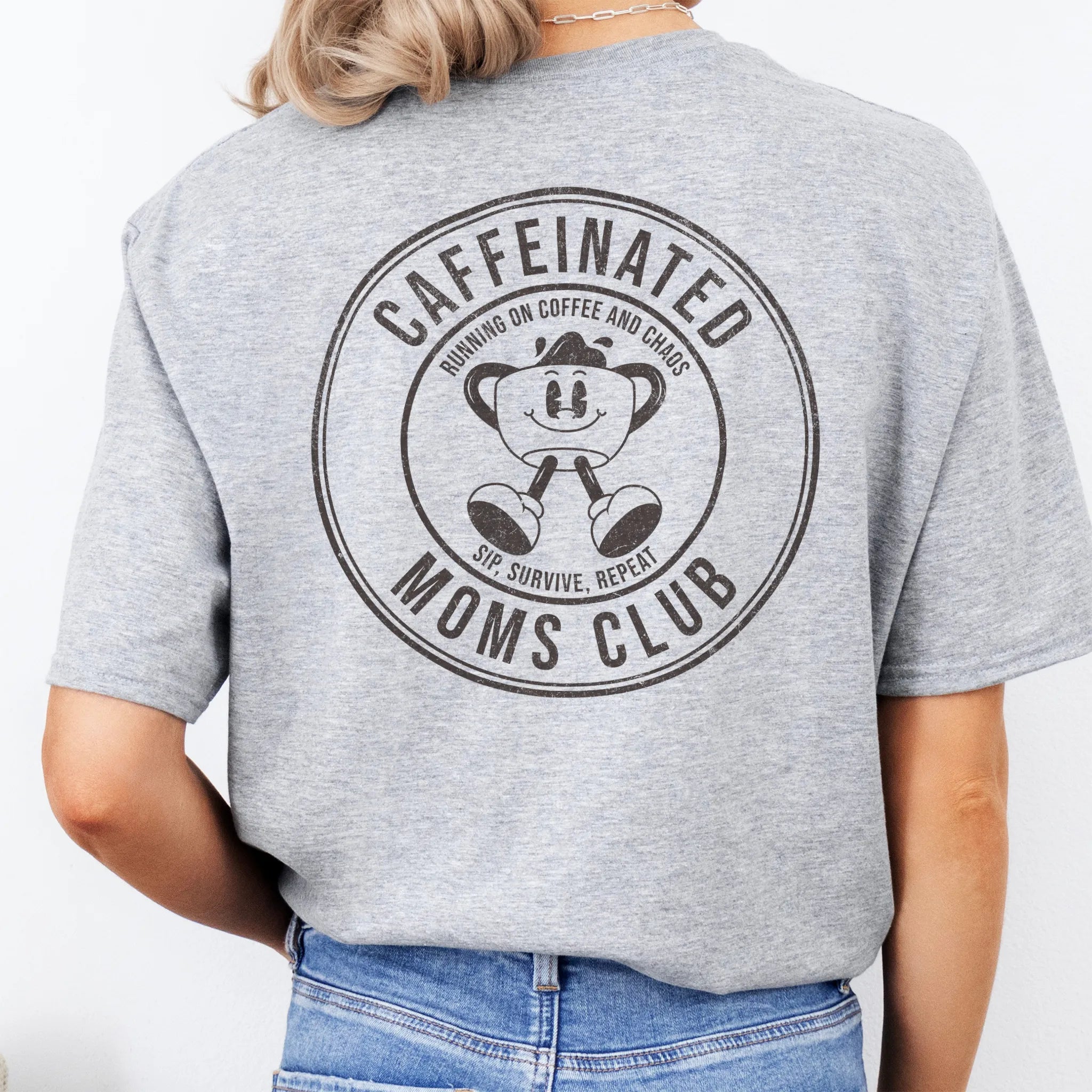 Sport Grey Oakley June T Shirt back view Caffeinated Moms Club large circle badge text Running on Coffee and Chaos Sip Survive Repeat vintage mascot coffee cup distressed print