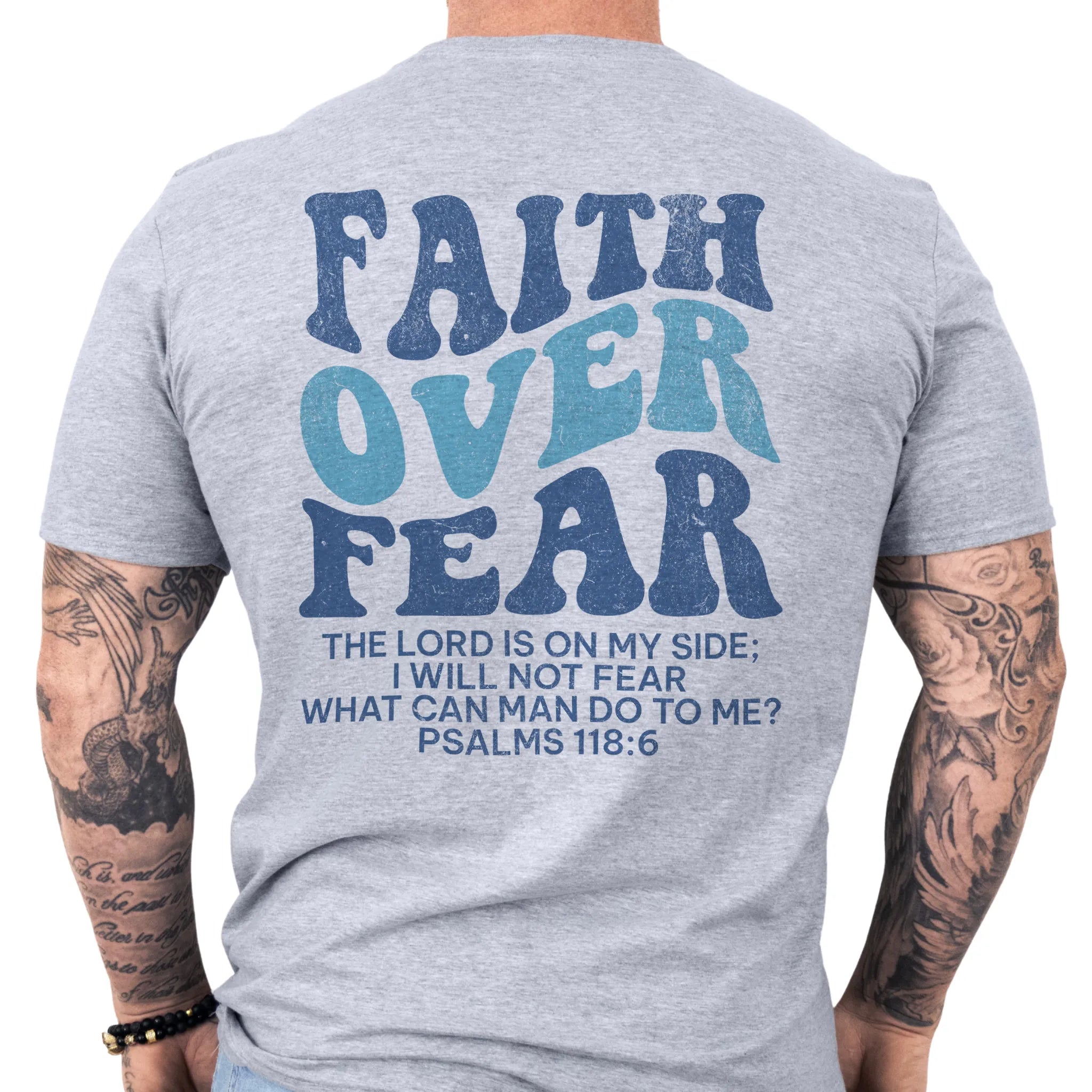 Sport Grey Oakley June t shirt, mens fit, large back lettering reads Faith Over Fear with supporting scripture lines, studio back view