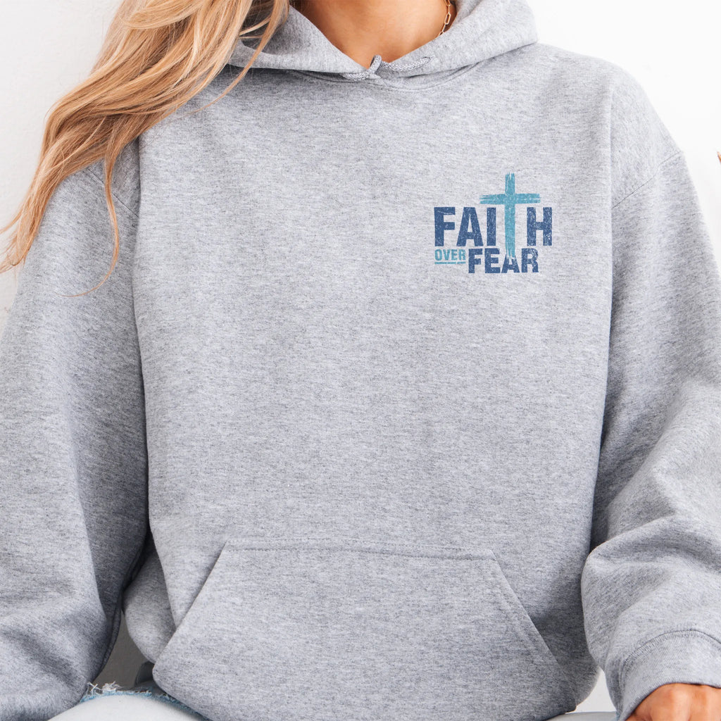 Sport Grey Oakley June hoodie, left chest badge reads Faith Over Fear with small cross, kangaroo pocket and relaxed modern fit, studio front view
