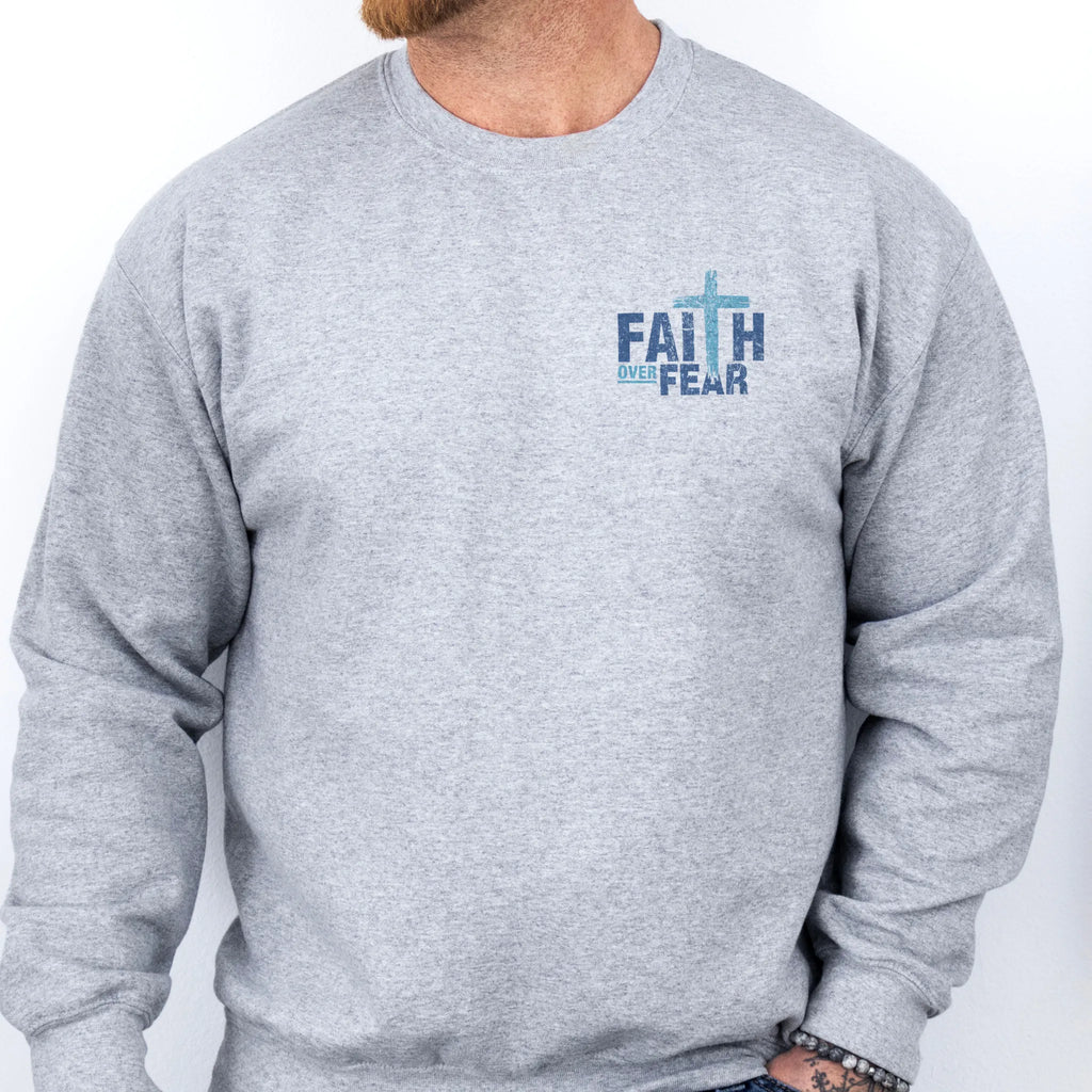 Sport Grey Oakley June sweatshirt, mens fit, left chest badge reads Faith Over Fear with small cross, studio front view